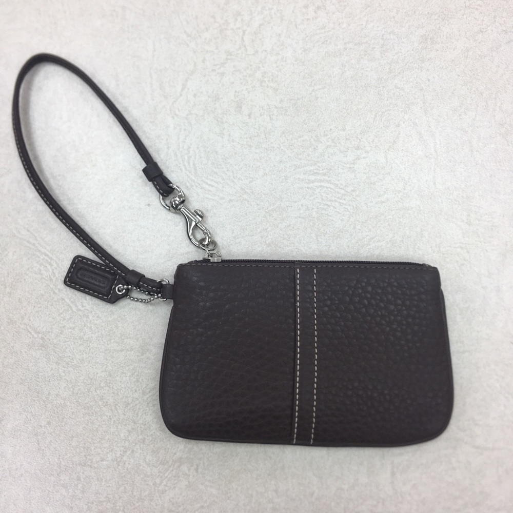 Brown leather Coach wristlet